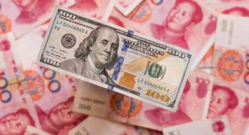China plays down yuan depreciations trade impact