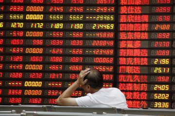 Chinese shares open a tad higher on Mon.
