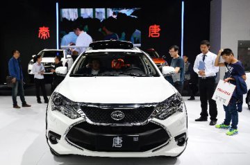 China cuts travel taxes on 2,299 energy-saving cars, NEVs