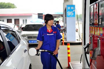 China raises benchmark product oil prices effective Wed.