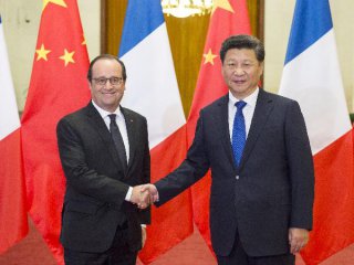 China Focus: Chinese, French presidents reach deal on climate change