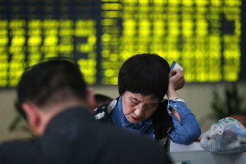 Chinese shares sink sharply on profit taking Friday