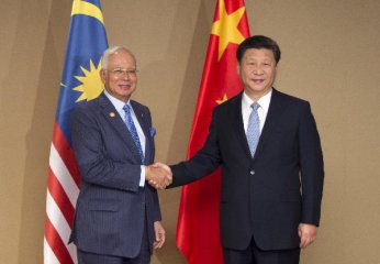 Xi pledges priority to ties with Malaysia in Chinas neighborhood diplomacy
