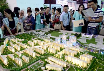 Chinese province scraps home-buying curbs to speed up de-stocking