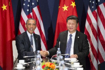 Xi meets Obama ahead of UN climate conference, pledging cooperation