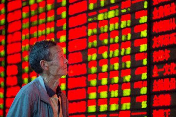 Chinese shares open tad higher Mon.