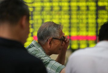 Chinese shares open tad lower Tue.