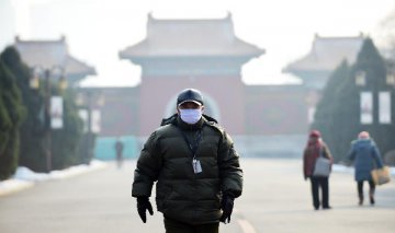 Beijing to step up efforts to combat smog after red alert