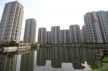 China tackles housing glut to arrest growth slowdown