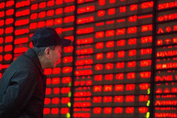 Chinese shares close higher Friday