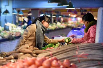 China February consumer prices up 2.3 pct, higher than expected