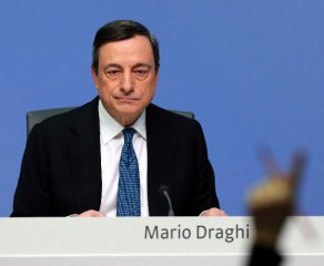 ECB cuts benchmark interest rate to record low of zero percent