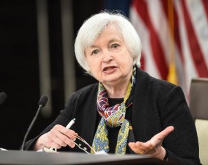 Fed signals slower rate hikes amid global risks