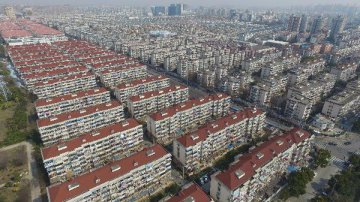Shanghai raises purchase thresholds to cool home prices