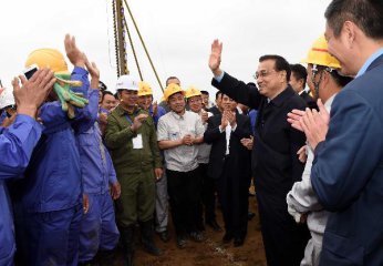 Chinese premier wants better-quality products, services