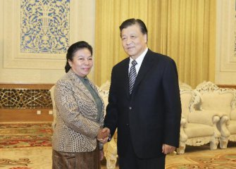 Ruling parties of China, Laos vow to further cooperation