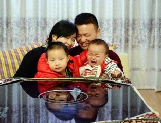 Xi stresses adherence to family planning policy
