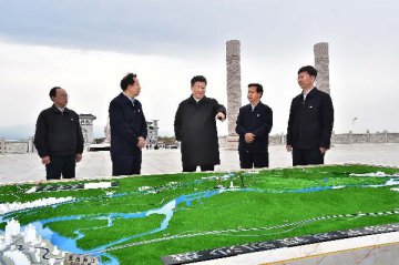 Xi stresses importance of cooperative farming