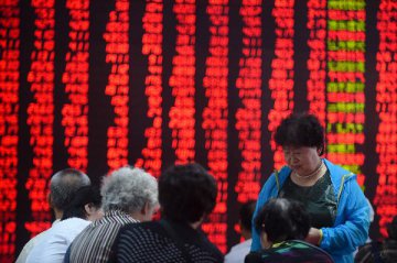 Chinese stocks dip slightly Tuesday after eventful trading day