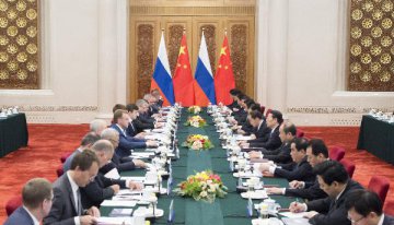China, Russia pledge to expand investment cooperation