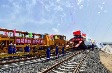 China upgrades plan to boost rail network