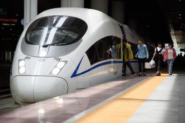 Chinese bullet trains cross in world first