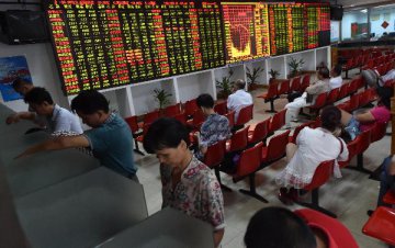Chinese shares close lower Friday