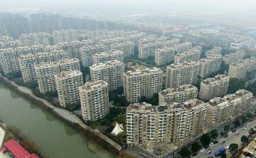 More Chinese cities to move to tame housing price rise: report
