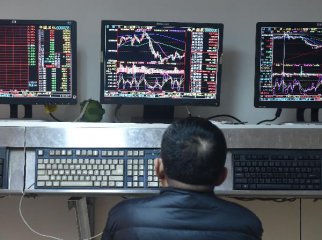 Chinese shares open lower Wednesday