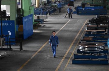 China industrial profit growth accelerates to 14.5 pct in November