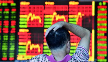 Chinese shares close mixed after soft service PMI data