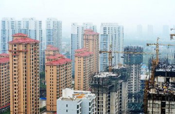 China scales up regulation of real estate developers, agents