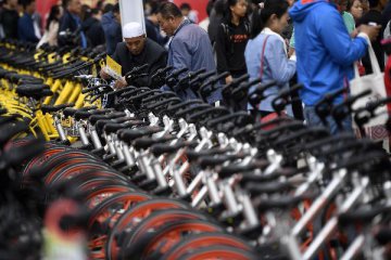 Beijing to regulate thriving bike-sharing industry