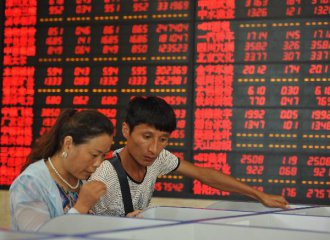 Chinese shares open mixed Monday