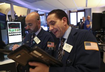 Dow, S&P 500 notch records, dollar rises after new Fed policy