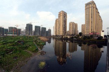 Chinese cities fine-tune policies to steer housing market growth