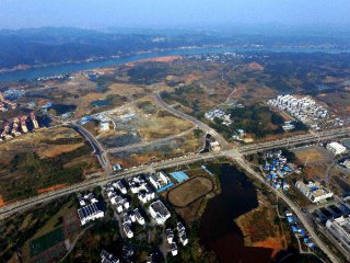 China to allow non-property enterprises, villages to build houses