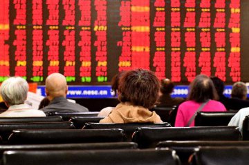 Chinese shares close mixed Friday
