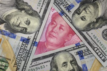 Chinas yuan funds for foreign exchange rise in April