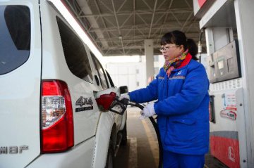China to raise retail prices of gasoline, diesel