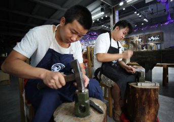 Chinas new tax brackets reduce individual, corporate burden