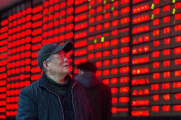 Chinese shares up more than 4 pct at midday