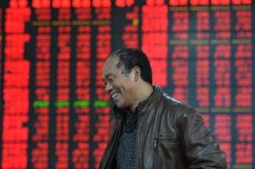 Chinese shares close higher midday