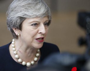 ​British PM May insists Brexit deal vote to go ahead next week