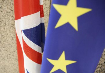 British PM May postpones Brexit vote by March 12