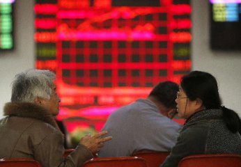 ​Chinese shares close mixed Wednesday