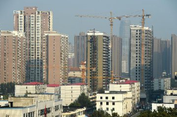 China to prudently advance legislation on real estate tax