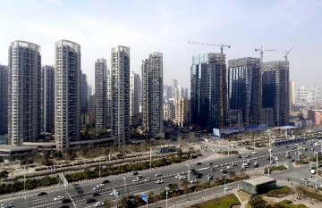 Chinas home prices edge up in March