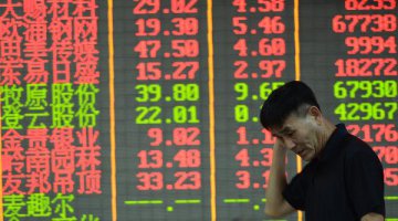 Chinese shares open mixed Monday