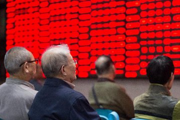 Chinese shares close higher Monday